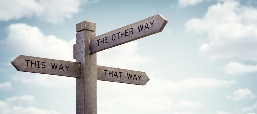 Crossroad signpost saying this way, that way, the other way concept for lost, confusion or decisions