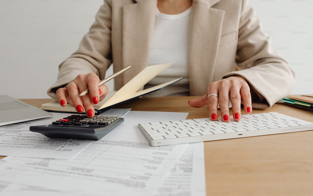 An accountant filling out forms